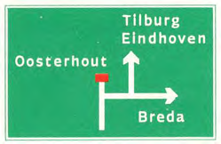 Groen wegwijzerbord met plaatsnamen (Tilburg, Eindhoven, Oosterhout, Breda) en pijlen. Betekenis: bewegwijzering; aanduiding van hoofddoelen, plaats- en vaarwegnamen.